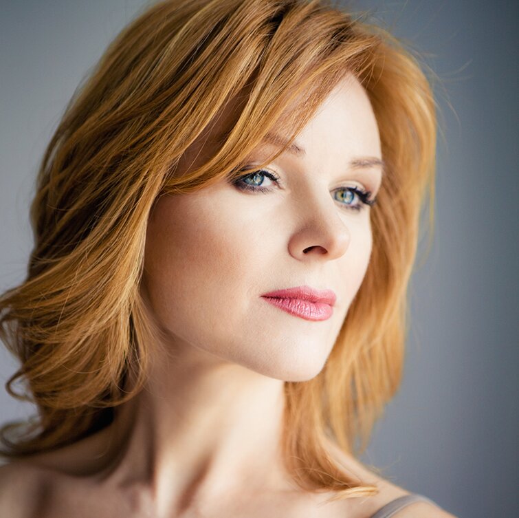 red haired facelift model wearing makeup