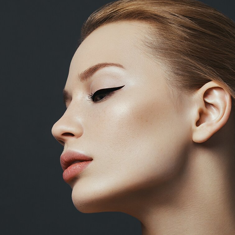 Philadelphia earlobe repair model wearing makeup