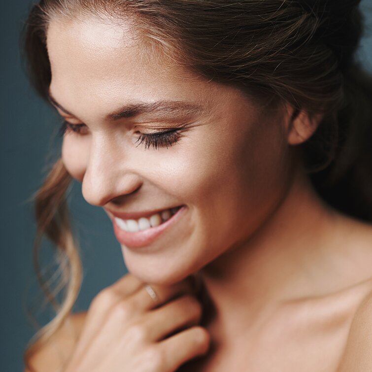 Philadelphia restylane model smiling and looking down